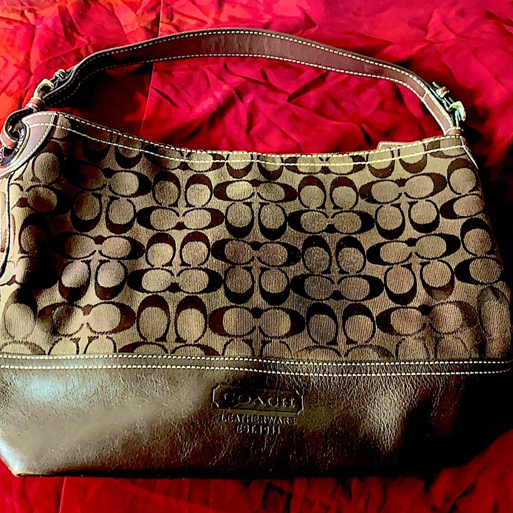 Chocolate brown coach canvas and leather tote bag.